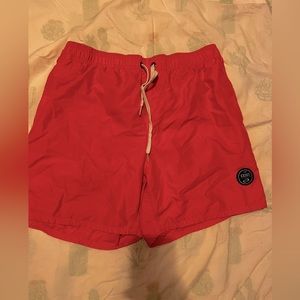 Coral swim trunks